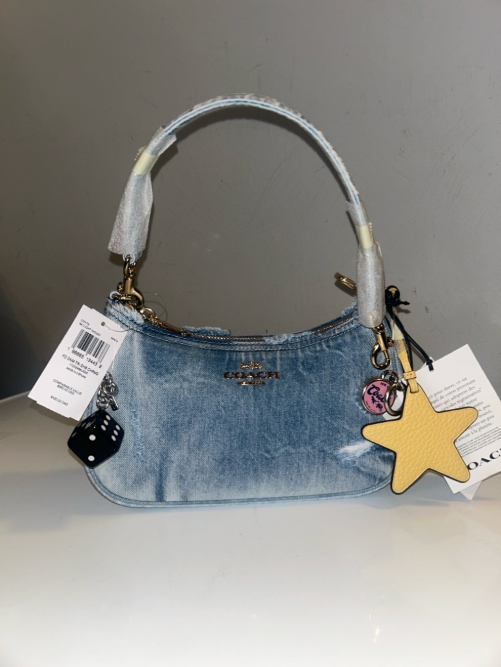 Coach Teri Light Blue Denim Mini Bag with Yellow Star Charm